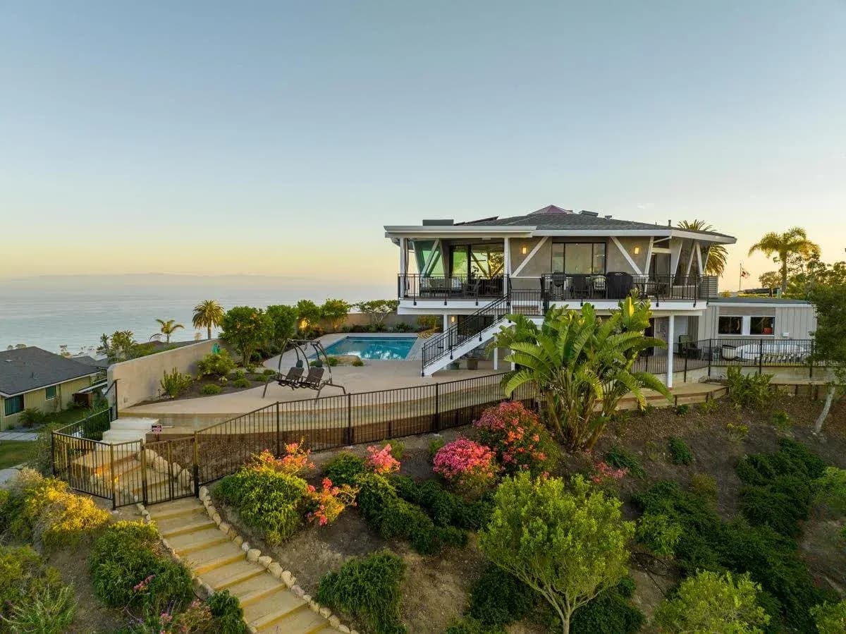Hillside estate at dusk overlooking the Santa Barbara coast
